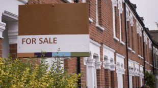 for sale sign for downsizing home article for title sussex www.titlesussex.co.uk