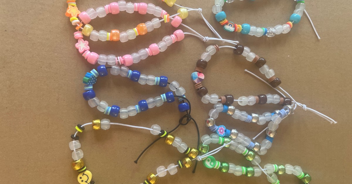 Eight bracelets Rosie has made, each with different designs