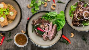 Shot of healthy meals like lean meat, salads, nuts, Asian vibes. Meal prep feature Title Sussex Magazine www.titlesussex.co.uk