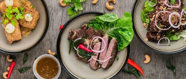 Shot of healthy meals like lean meat, salads, nuts, Asian vibes. Meal prep feature Title Sussex Magazine www.titlesussex.co.uk